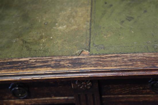 A late Victorian oak desk by Gillow, 3ft x 2ft 6in.